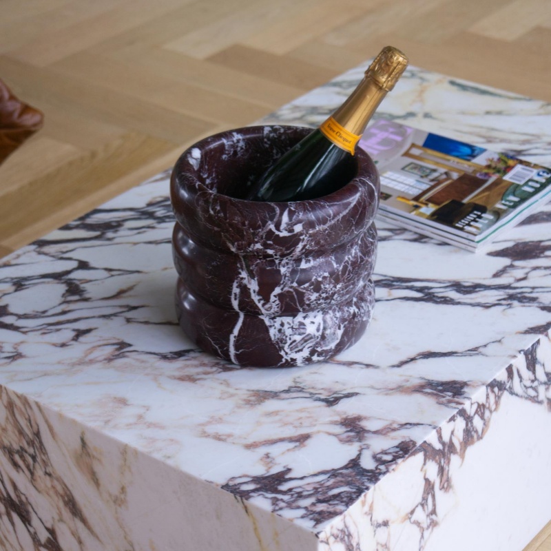 Marble Ribbed Ice Bucket with champagne bottle on marble coffee table - stylish bar accessory