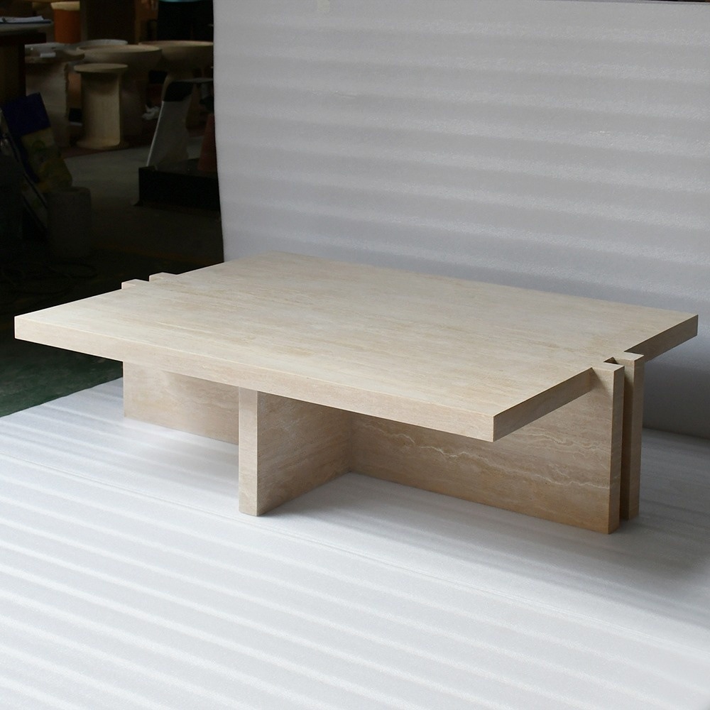 Natural beige travertine coffee table with modular puzzle legs - statement minimalist furniture