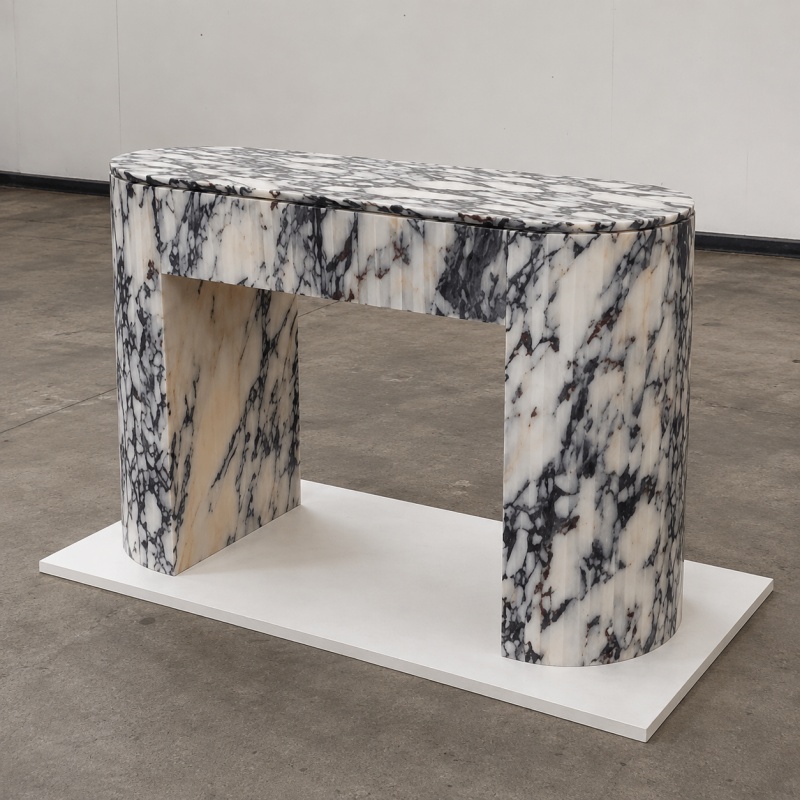 Sculptural ribbed Calacatta Viola marble sideboard with continuous natural marble veining