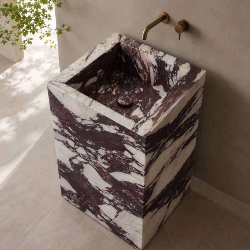 Freestanding Calacatta Viola marble single sink bathroom vanity with three full stone drawer fronts