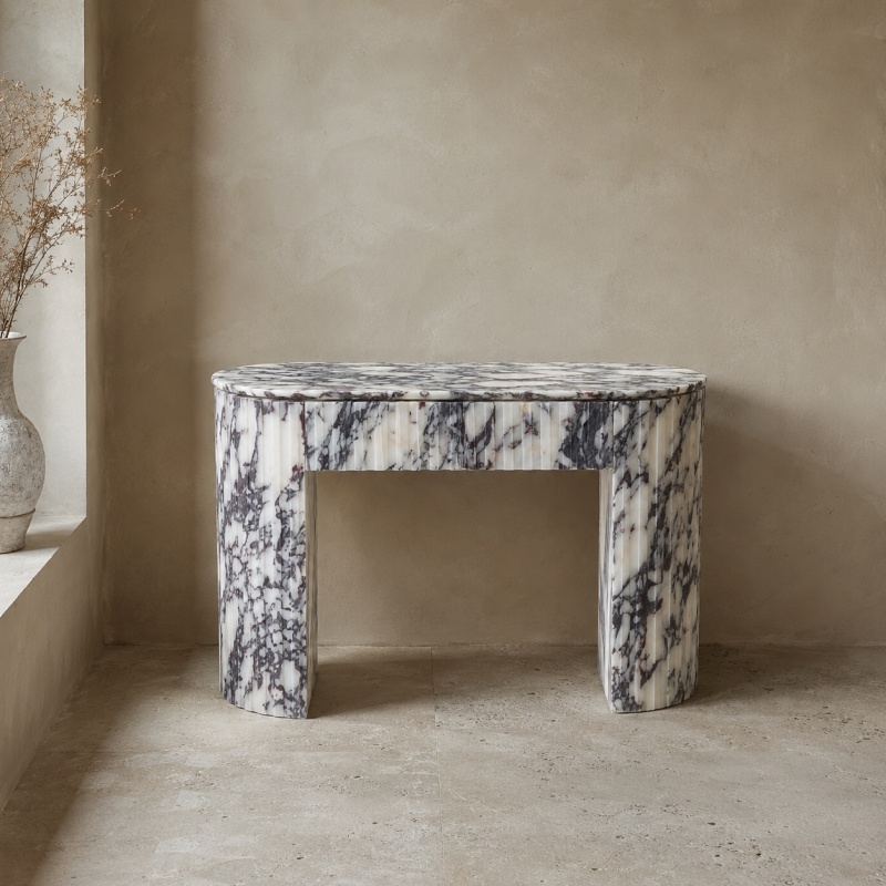 Calacatta Viola marble fluted console table with oval rounded top and curved ribbed pedestal legs